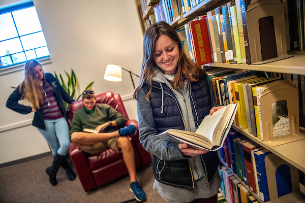 Student holding a book