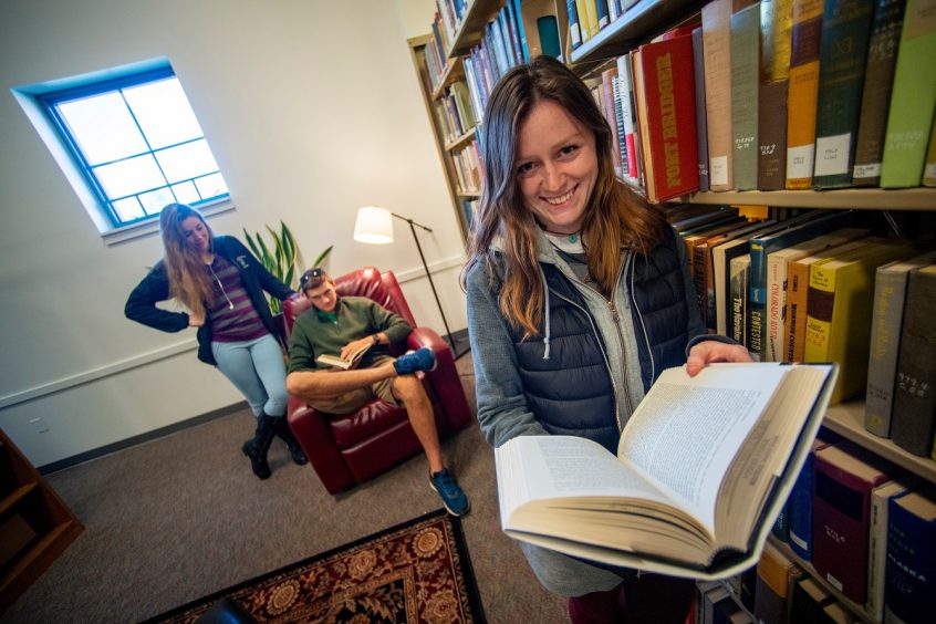 Student holding a library book