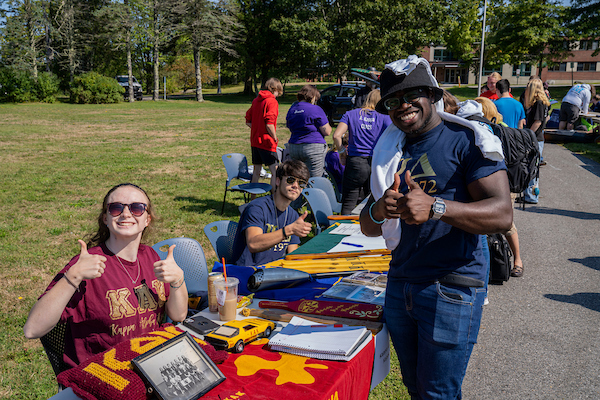 Two students from our greek orgs having fun at the Group and Org fair get together