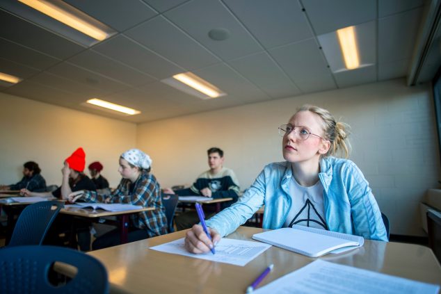 Student in a classroom at the University of Maine at Machias