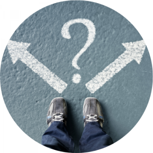 top down view of a someone's feet standing in front of two arrows pointing in different directions with a question mark. Link to Career Exploration pathway.