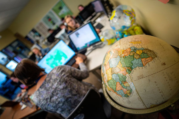 UMM's GIS laboratory with a globe shown in the foreground