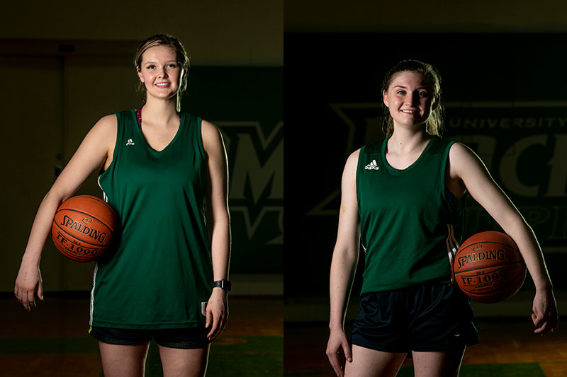 Player posing with basketballs