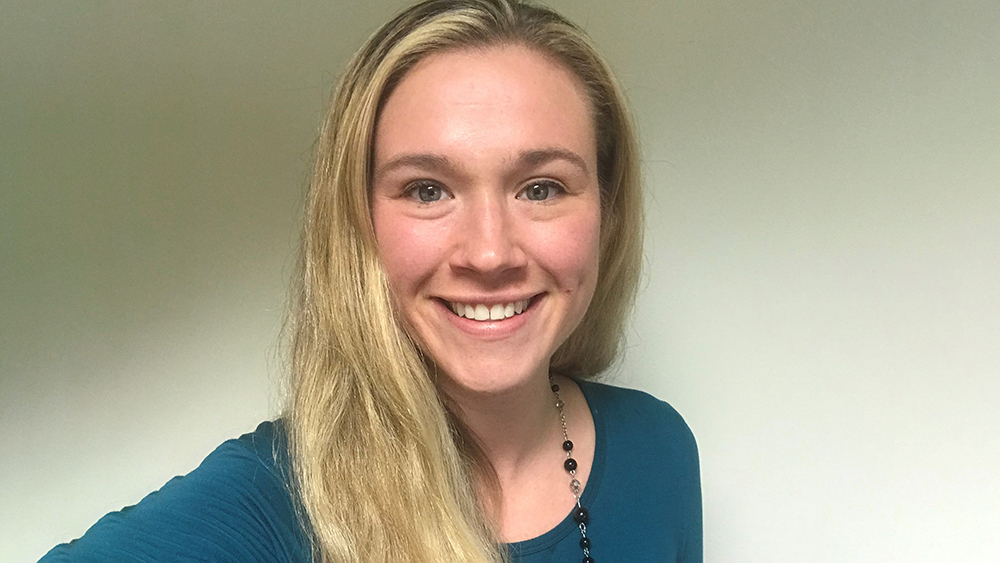 A portrait photo of a woman with long blond hair