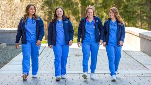 A photo of UMaine nursing students walking on campus