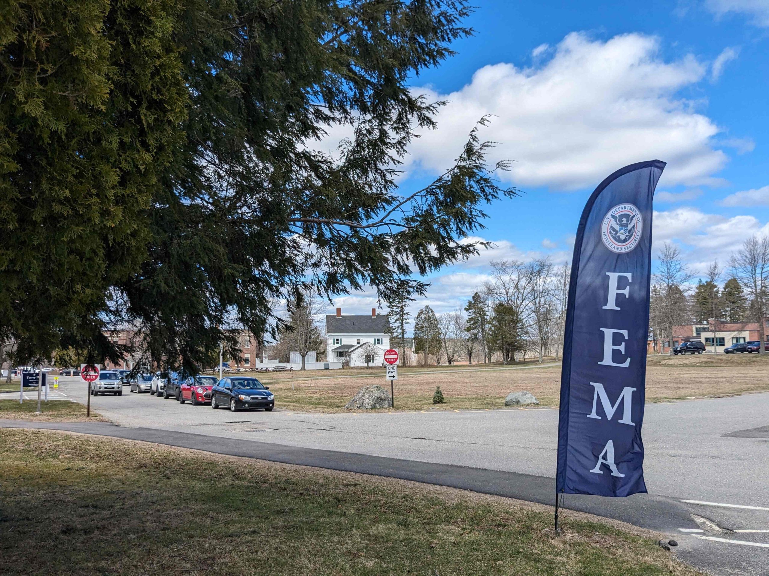A wide shot photo of campus from Torrey Hall with the FEMA sign to the right of the photo.