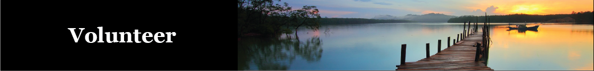 Wooden pier leading out over the water at sunrise. Copy: Volunteer