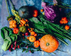 colorful, fresh produce on a blue table